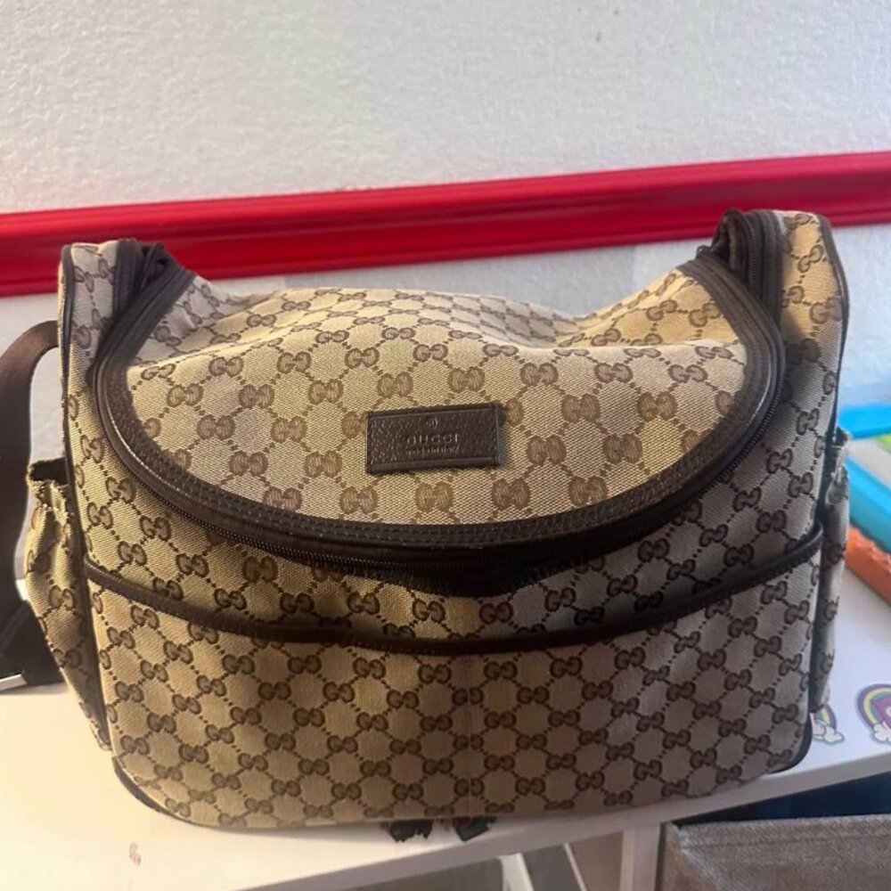 Gucci supreme Diaper Bag with bottle holder and additional coach pouch bag